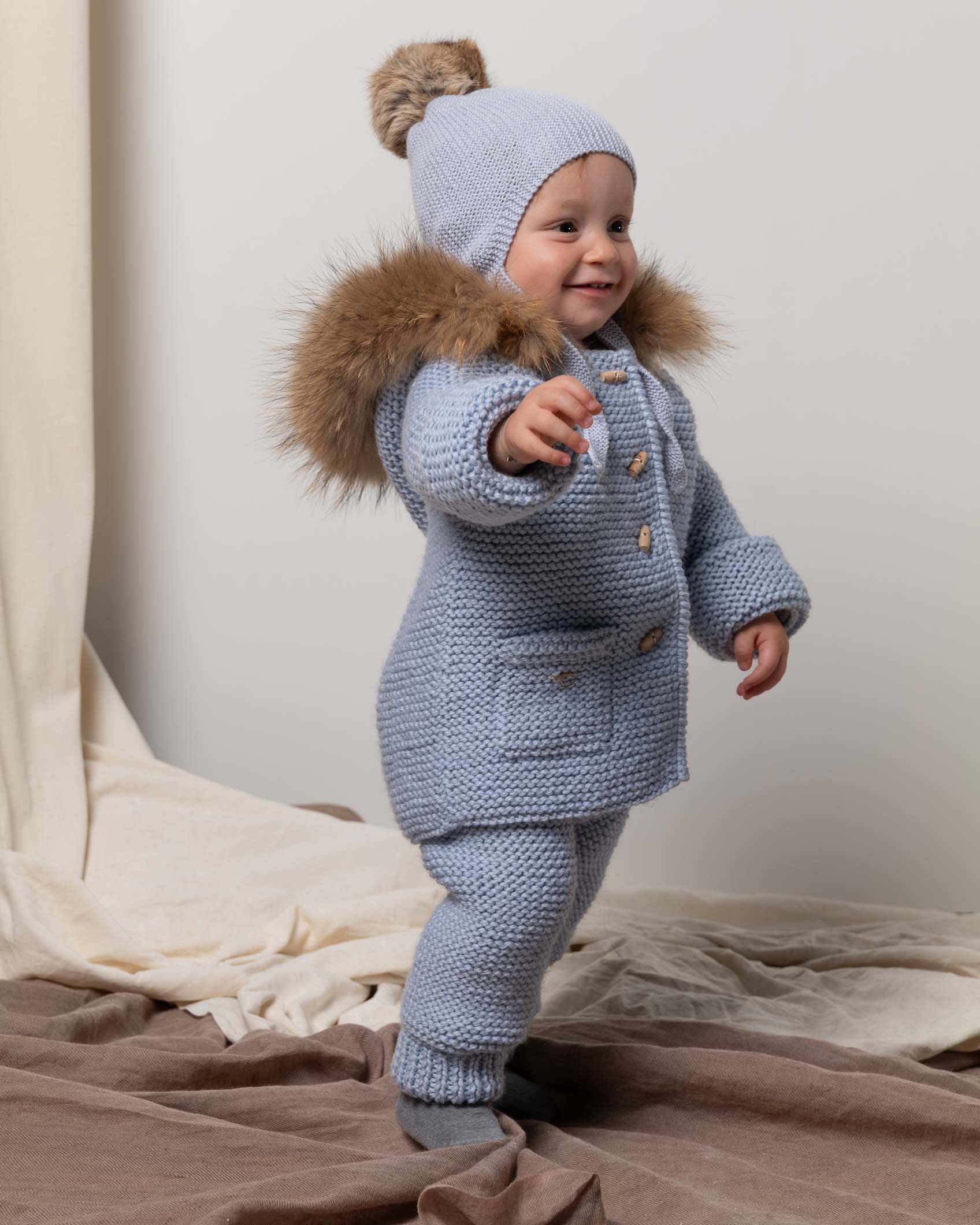 GORRO AVIADOR MERINO MARINO CON POMPON RAPADO 12 MESES CELESTE 2