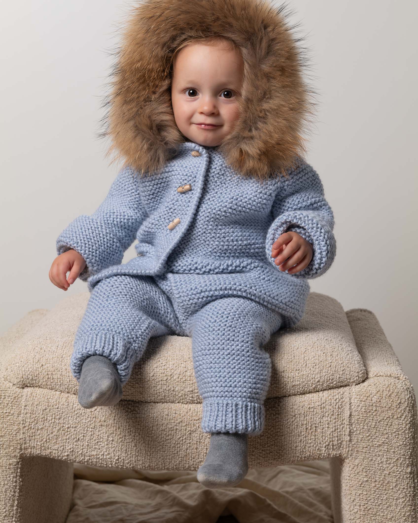 ABRIGO CAPUCHA MERINO PELO NATURAL BOLSILLOS CELESTE
