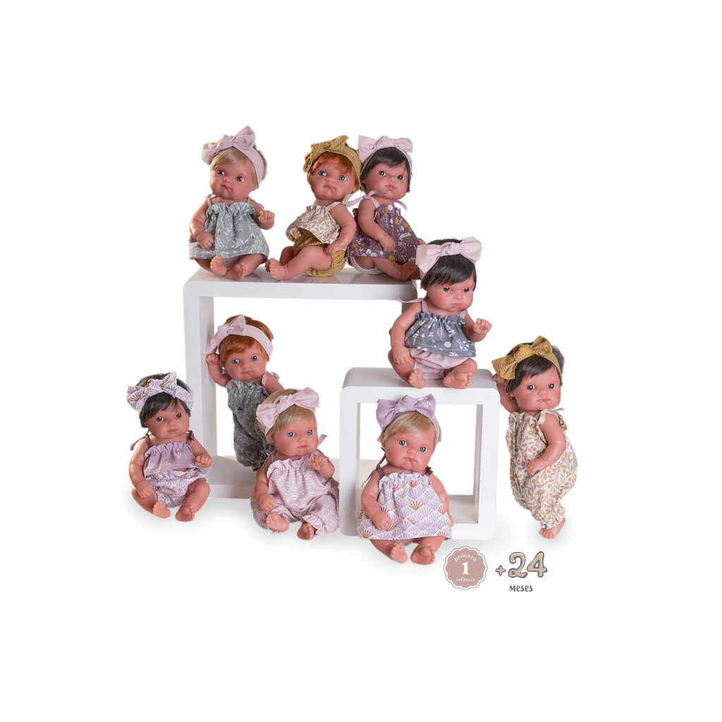 bebé mufly en expositor vestidos de colores