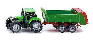 TRACTOR CON ESPARCIDOR DE ESTIÉRCOL SIKU