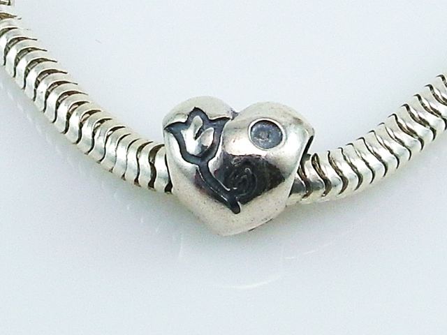 Abalorio corazon con tulipan de Plata de ley