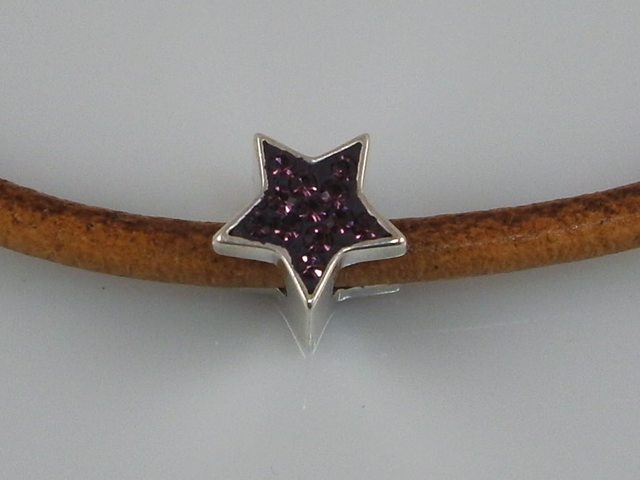 Entrepieza estrella de Plata de ley con cristal morado