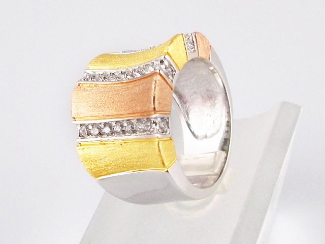 Anillo bandas doradas, rosa y Circonitas en Plata de ley