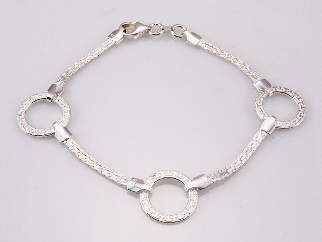 Pulsera circulos con greca de Plata de Ley