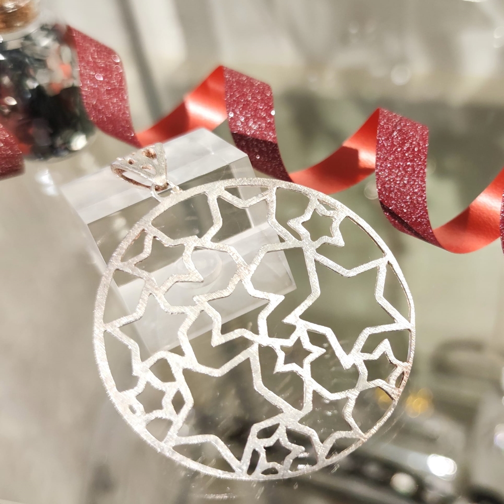 Colgante Estrellas caladas de Plata de ley 2