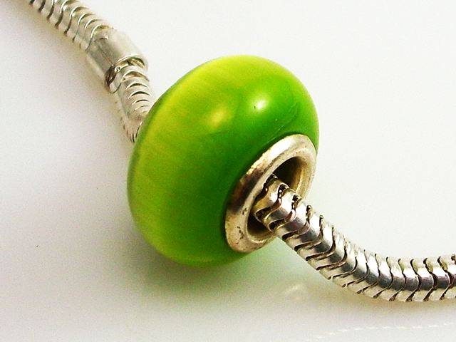 Entrepieza de Plata de ley con ojo de gato verde 1
