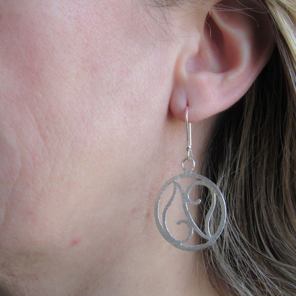 Pendientes figuras caladas de Plata de ley 1