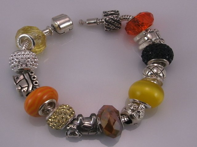 Pulsera abalorios plata   negro,naranja y amarillo