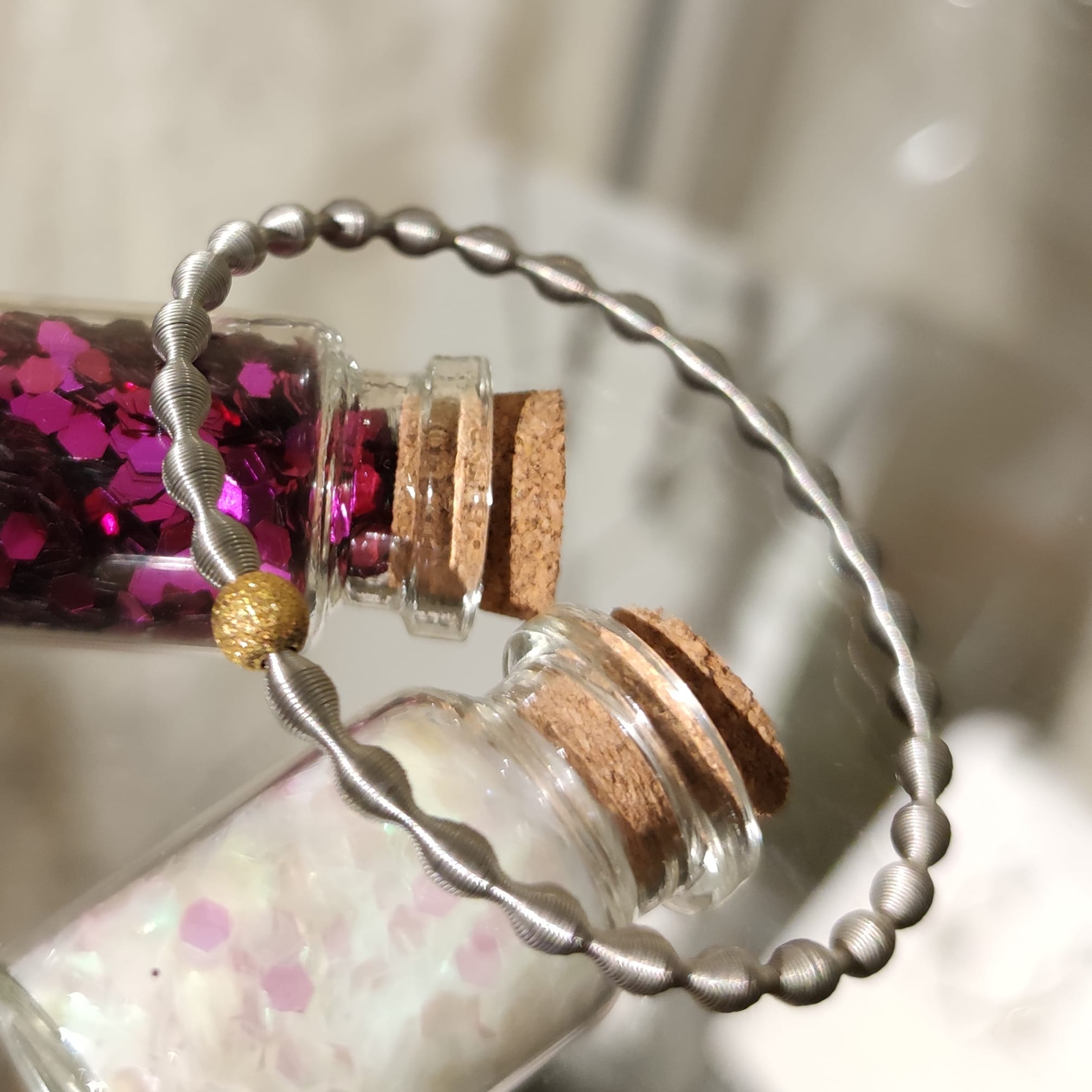 Pulsera con ondas de Acero y Plata de ley dorada 1