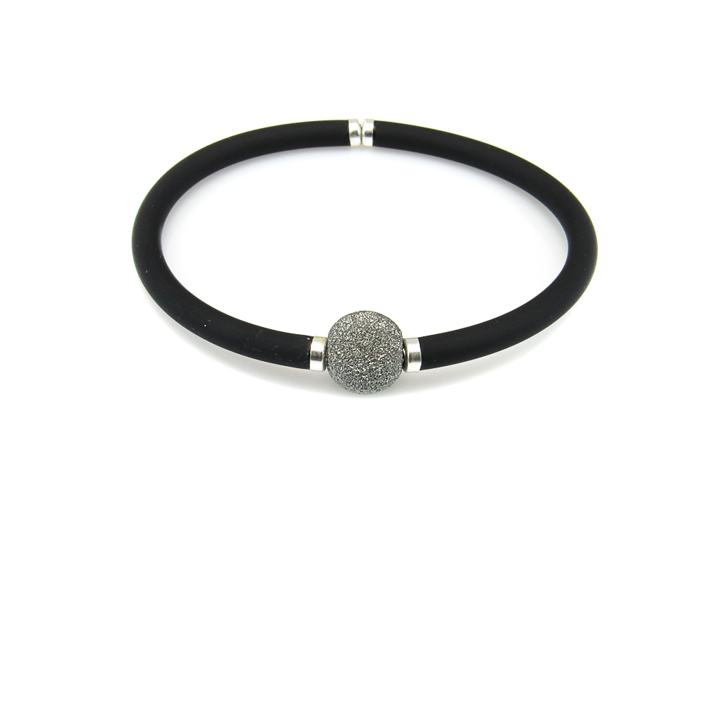Pulsera elástica en Caucho Negro con bola de Plata diamantada