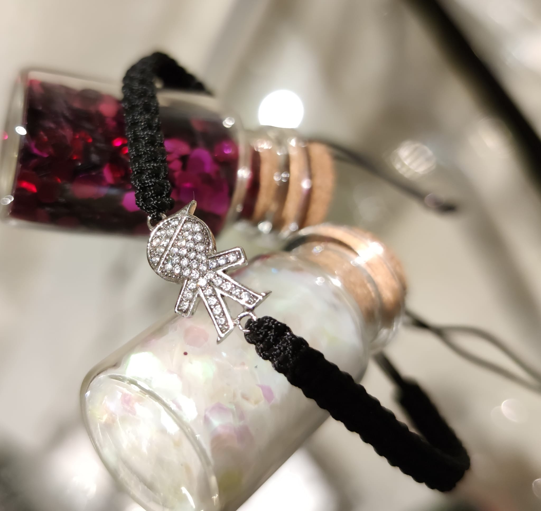 Pulsera hilo trenzado negro y niño de Plata con circonitas 1