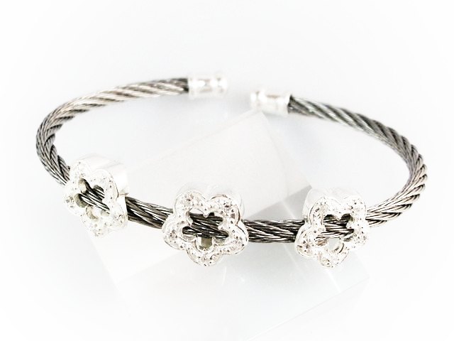 Pulsera hilo de Acero con flores de Plata y Circonitas