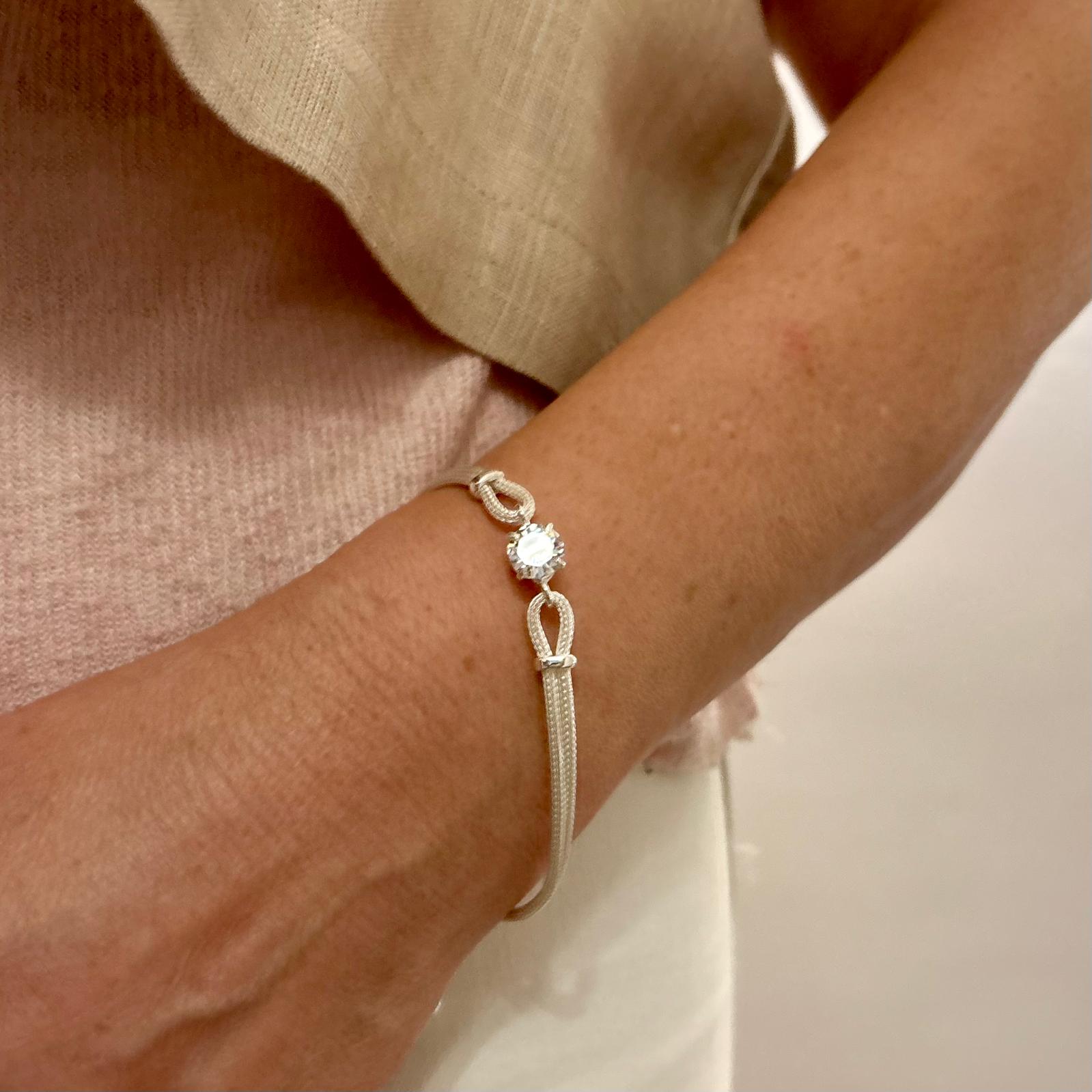 Pulsera cadena doble punto de luz central Circonita