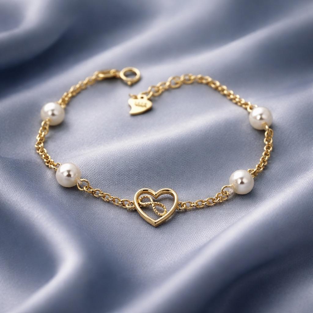 Pulsera infantil corazón e infinito de Plata chapada en Oro con Perlas cultivadas Primera Comunión