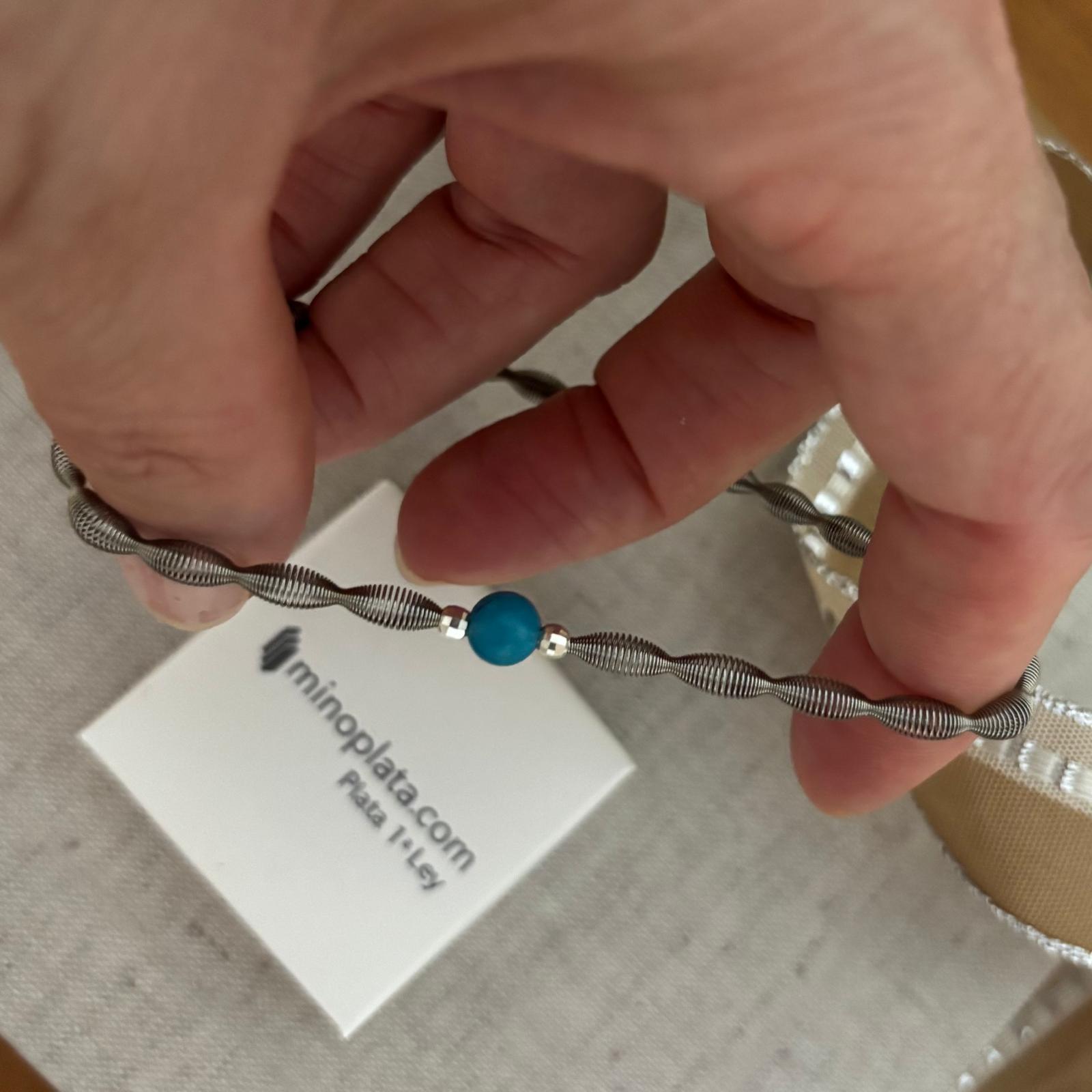 Pulsera elástica de Acero con bolita color turquesa y Plata de ley 925