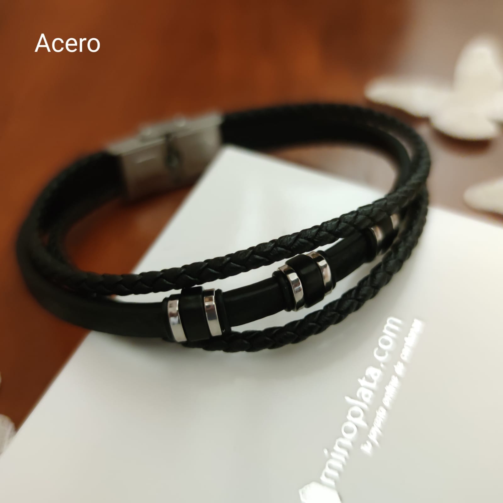 Pulsera cuero negro trenza y liso con motivos de Acero