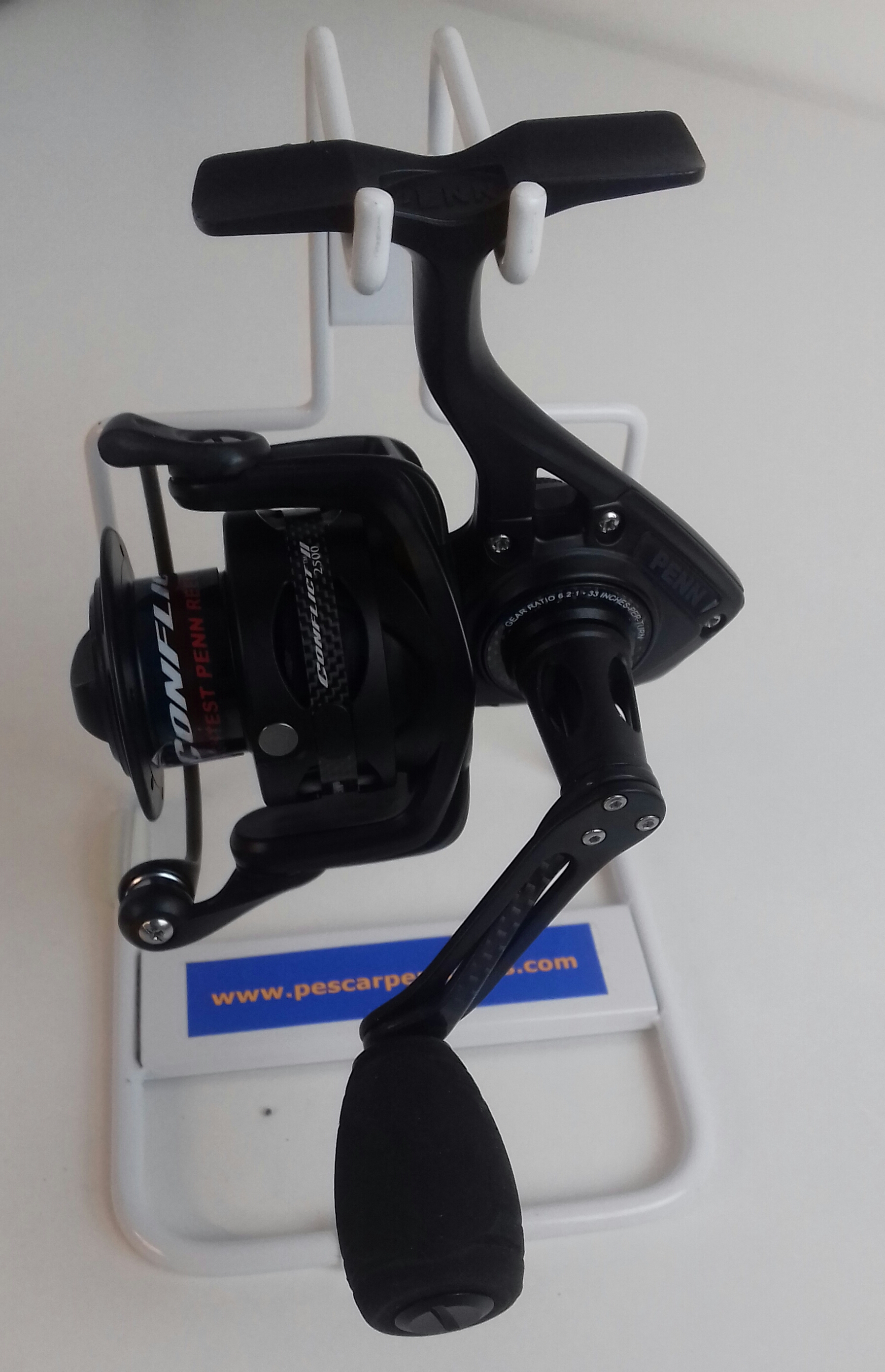 CARRETE PENN CONFLICT SPIN II 2500