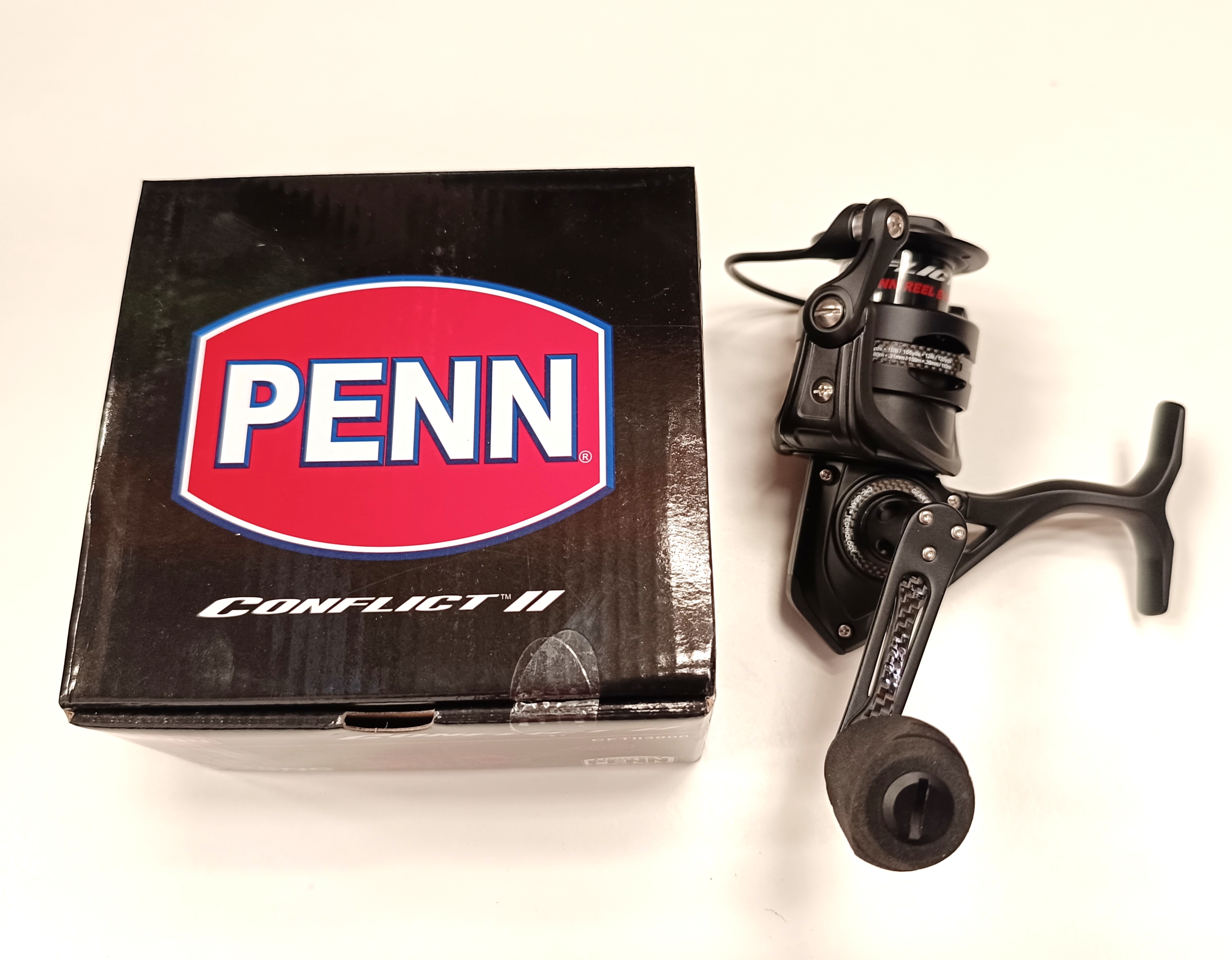 CARRETE PENN CONFLICT SPIN II 3000