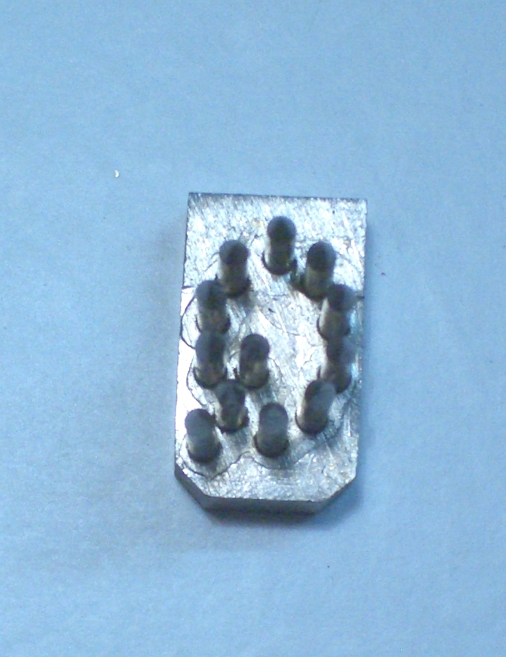 8mm letra "Q".
