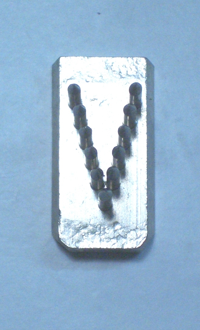 Letra "V" DE 10 mm.