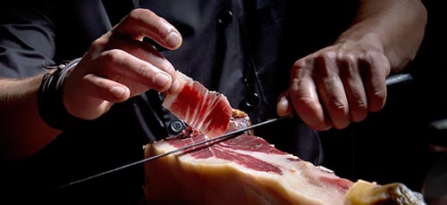 Imagen de jamón ibérico cortado a mano