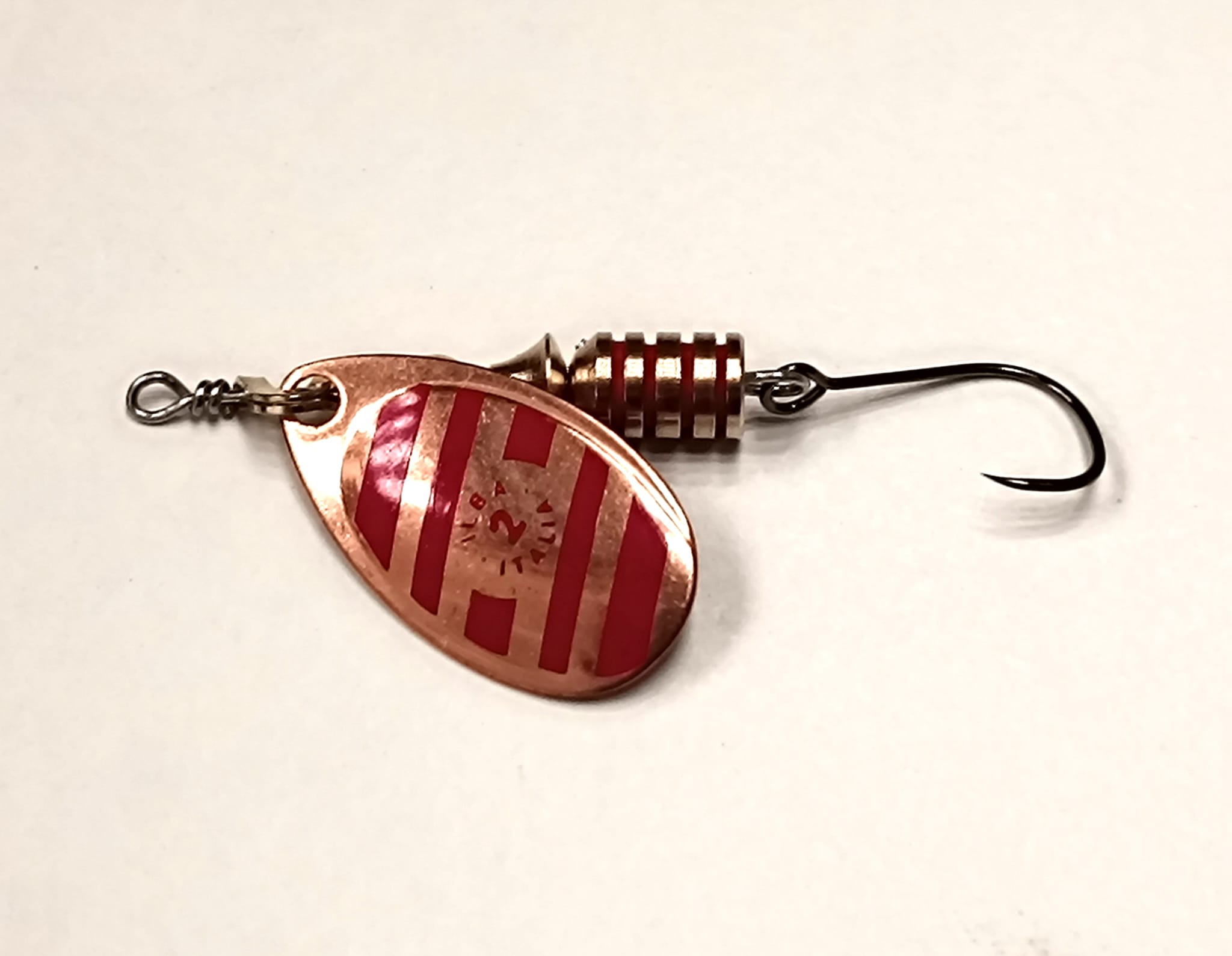 CUCHARILLA ILBA TONDO ZEBRA COBRE-ROJO N°0 2 GR (1 ANZUELO SIN MUERTE)