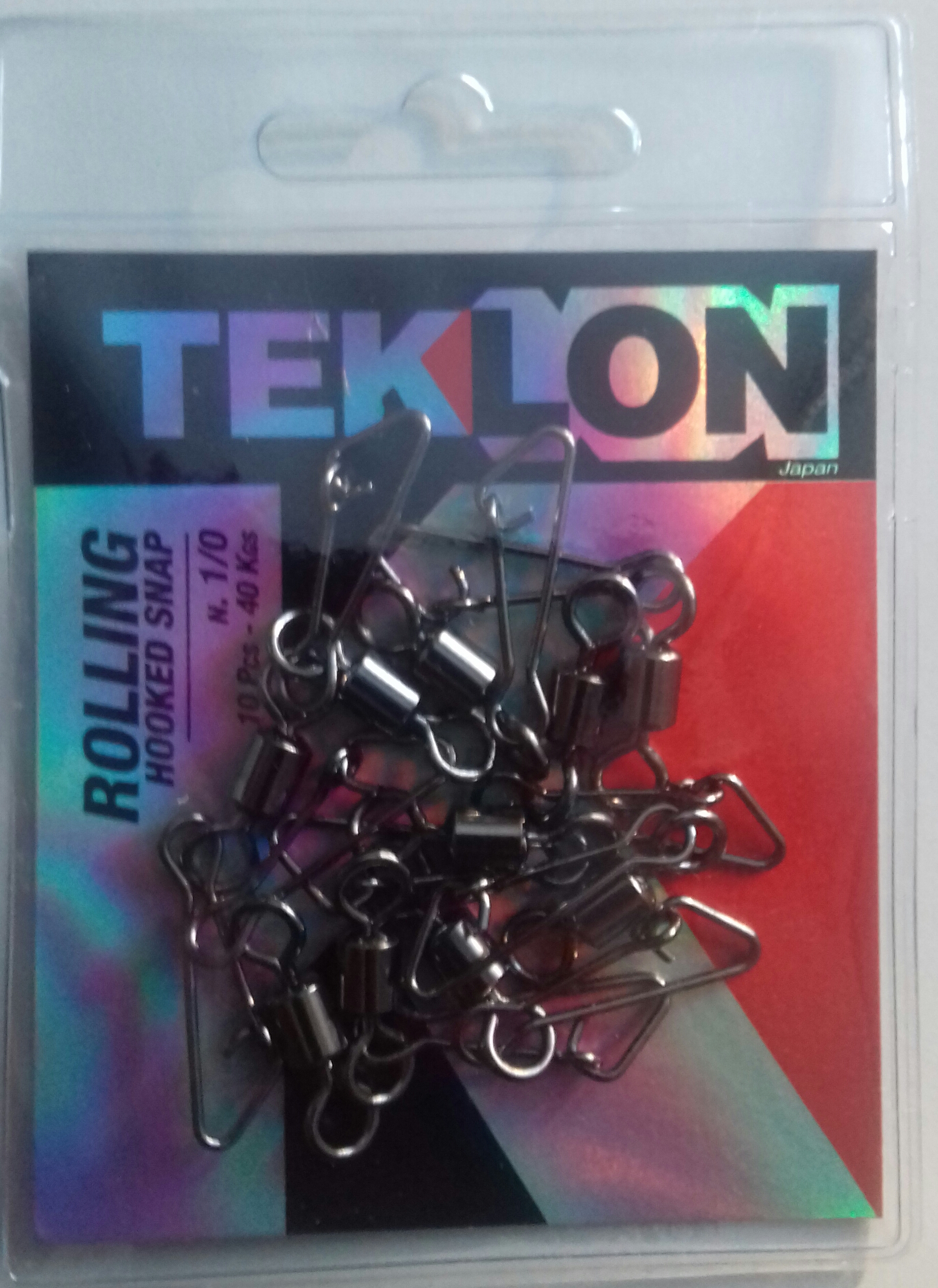 EMERILLON TEKLON ROLLING W/ HOOKED SNAP 1/0 (10 unidades)