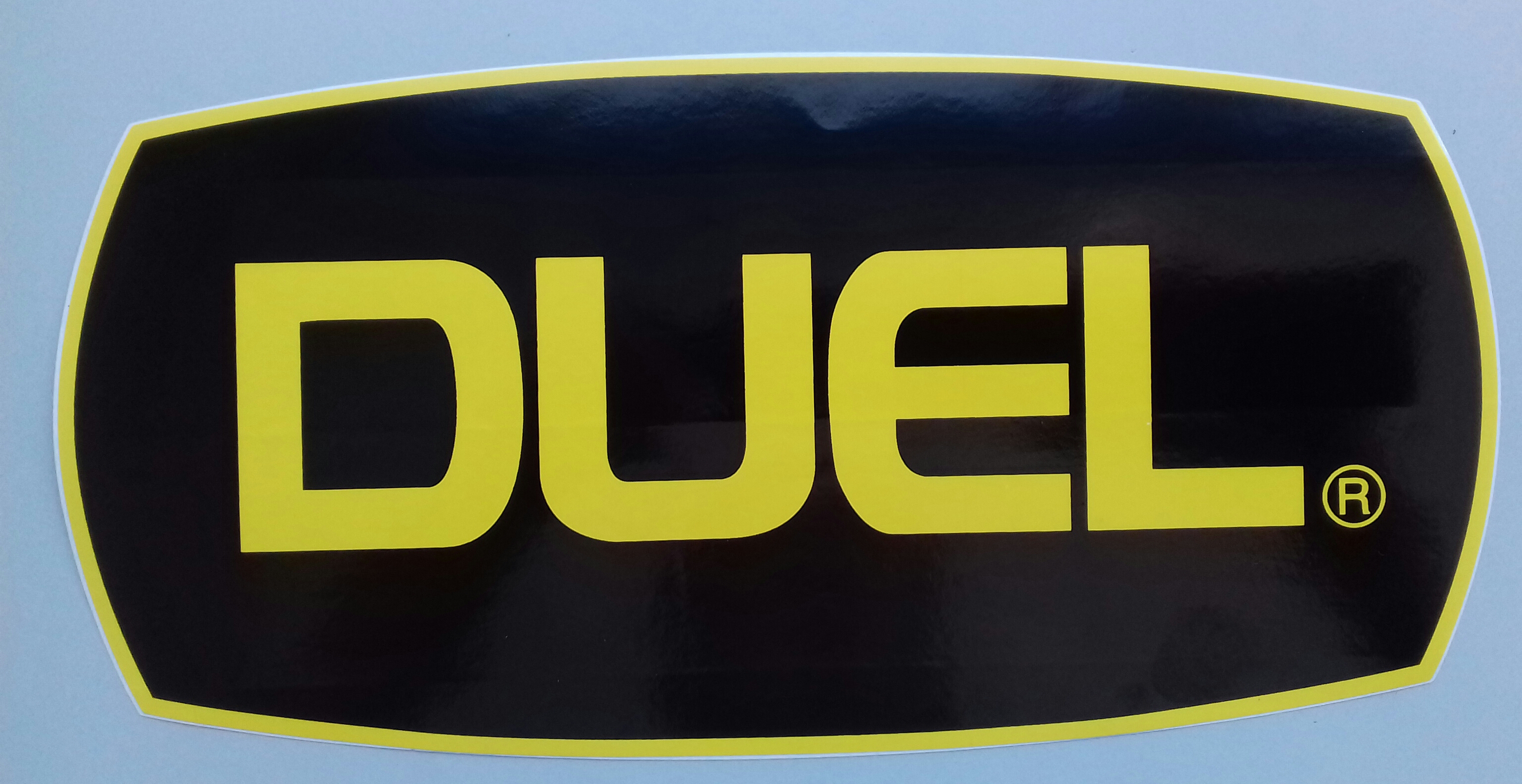 ADHESIVO DUEL 28X14 cm