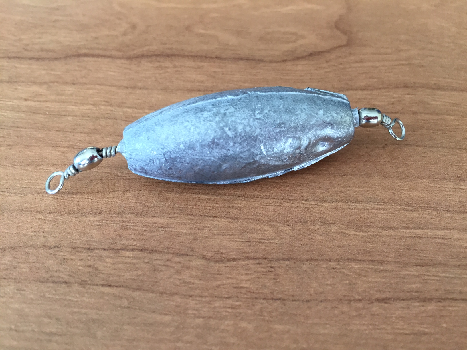 PLOMO OLIVA CON 2 EMERILLONes 10GR (unidad)