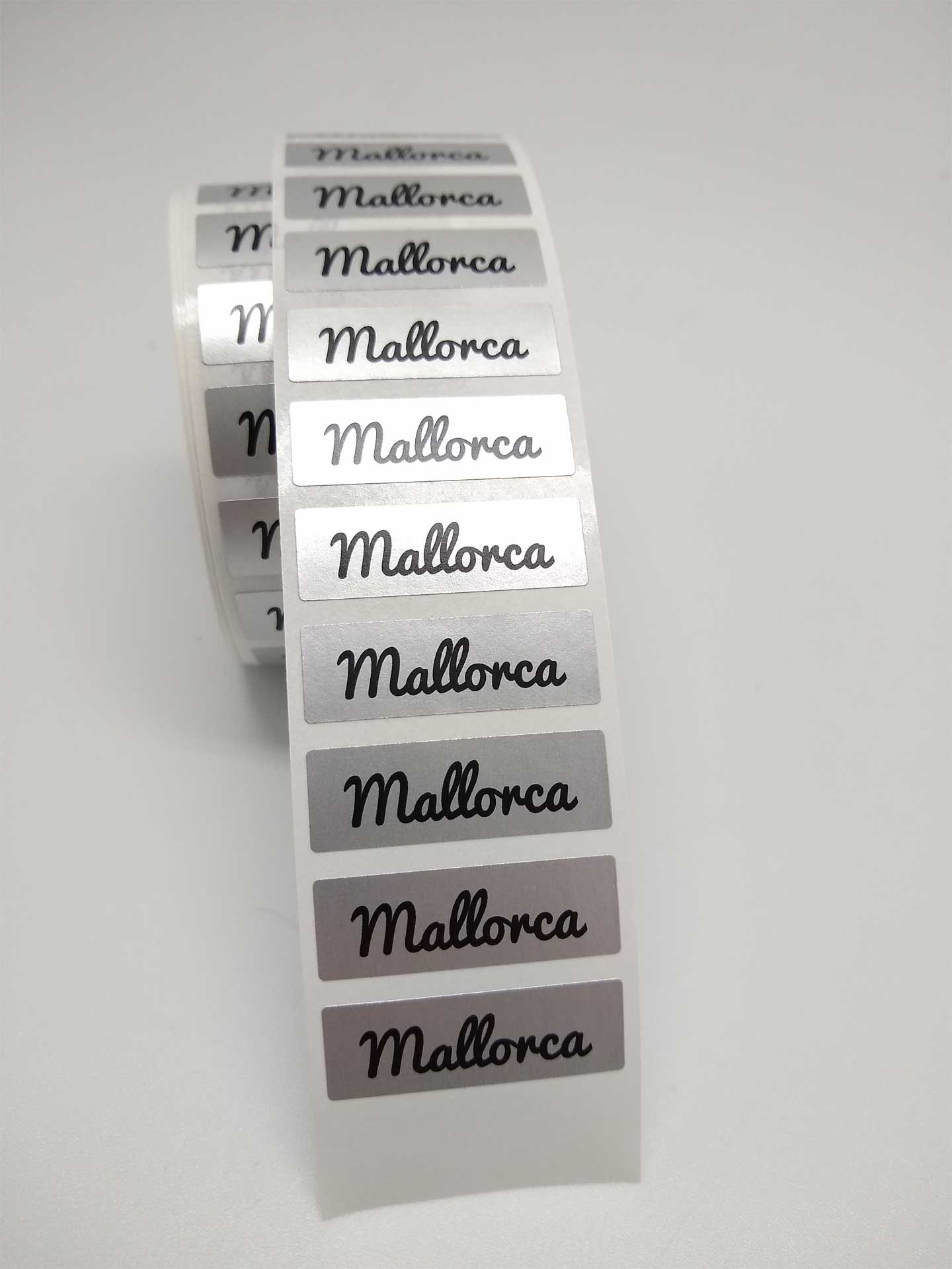 Et. Mallorca 30x10mm Plata mate+negro 500u