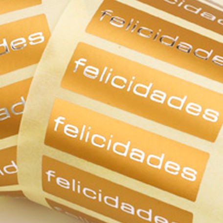 Felicitats oro 50x15mm 500u.