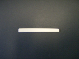 CEJUELA GUITARRA - PARTE INFERIOR (PUENTE) PLASTICO NACIONAL