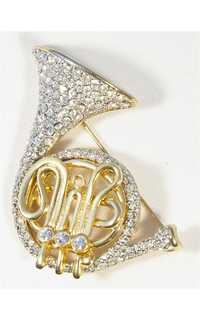 regalo - broche trompa oro acabado brillante