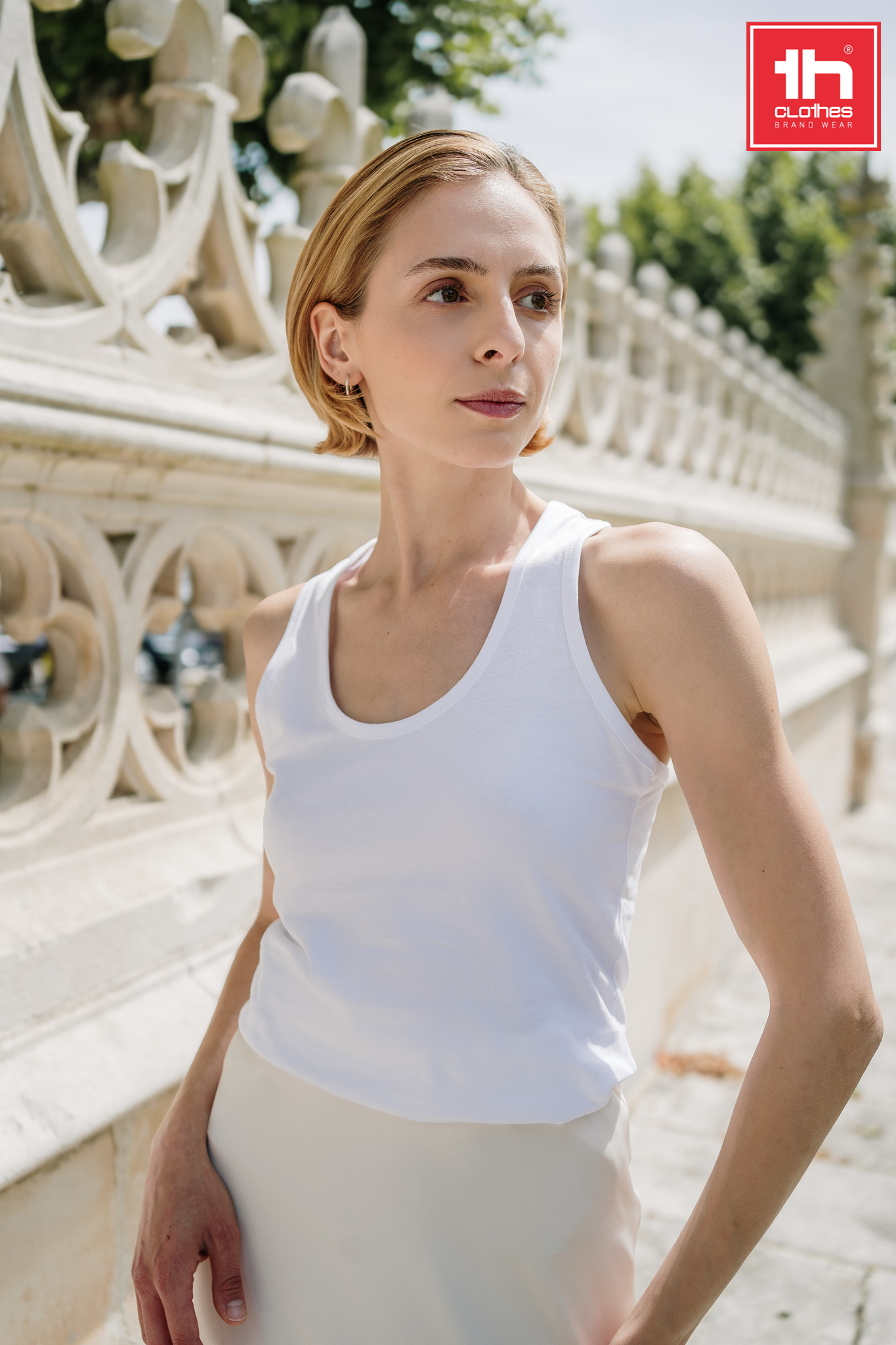 TIRANA - Camiseta sin mangas con espalda cruzada para mujer